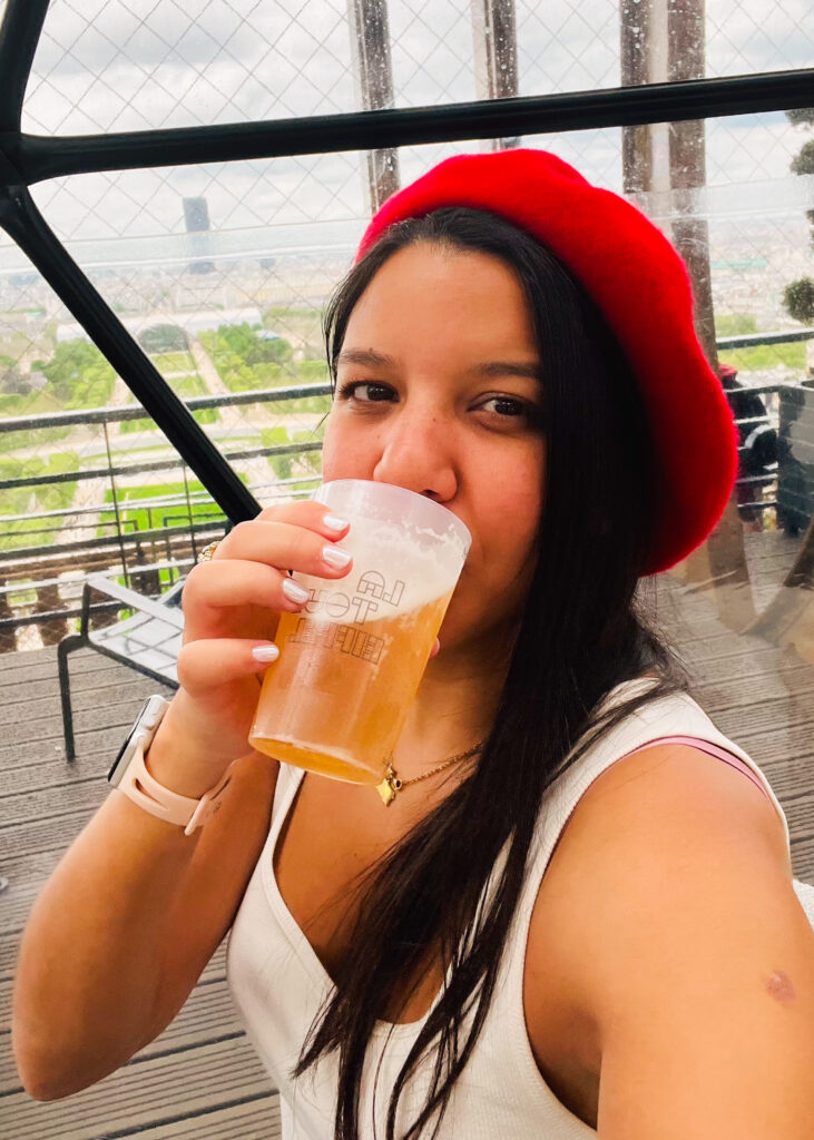 Drinking beer at the Eiffel Tower