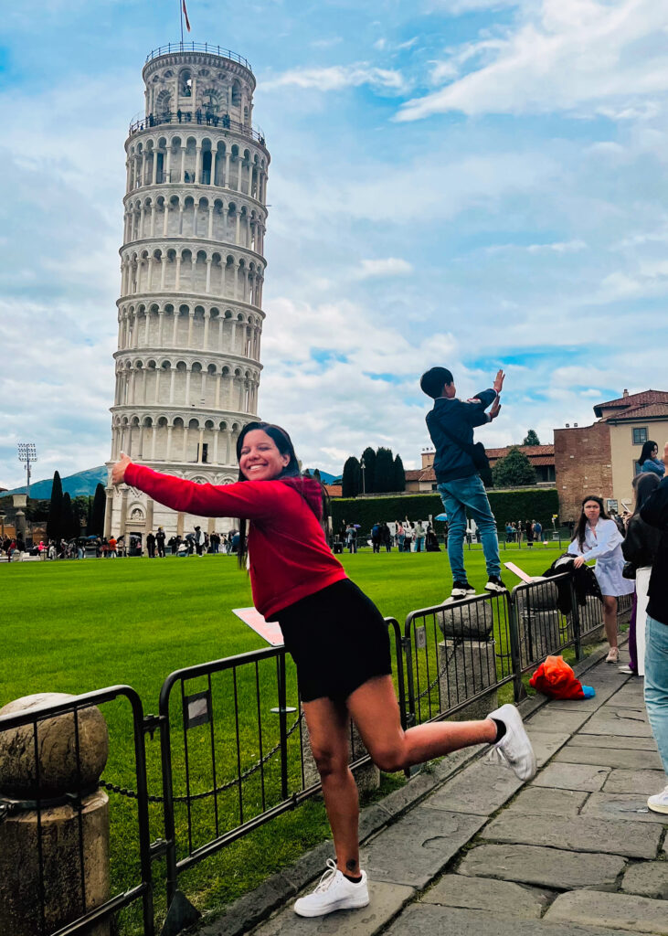 Laurie hugging the Leaning Tower of Pisa